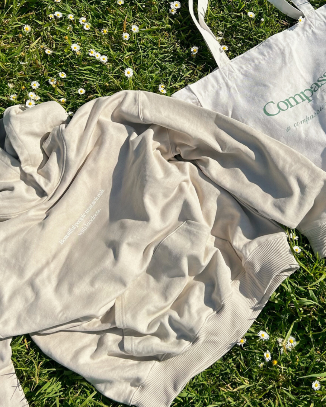 hoodie and tote bag sustainable vegan fashion compassion threads