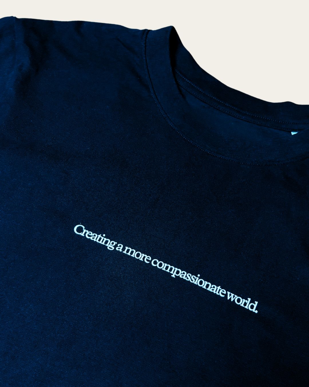 Creating A More Compassionate World T-shirt T-Shirt Compassion Threads Sustainable vegan clothing premium ethical cruelty-free fashion
