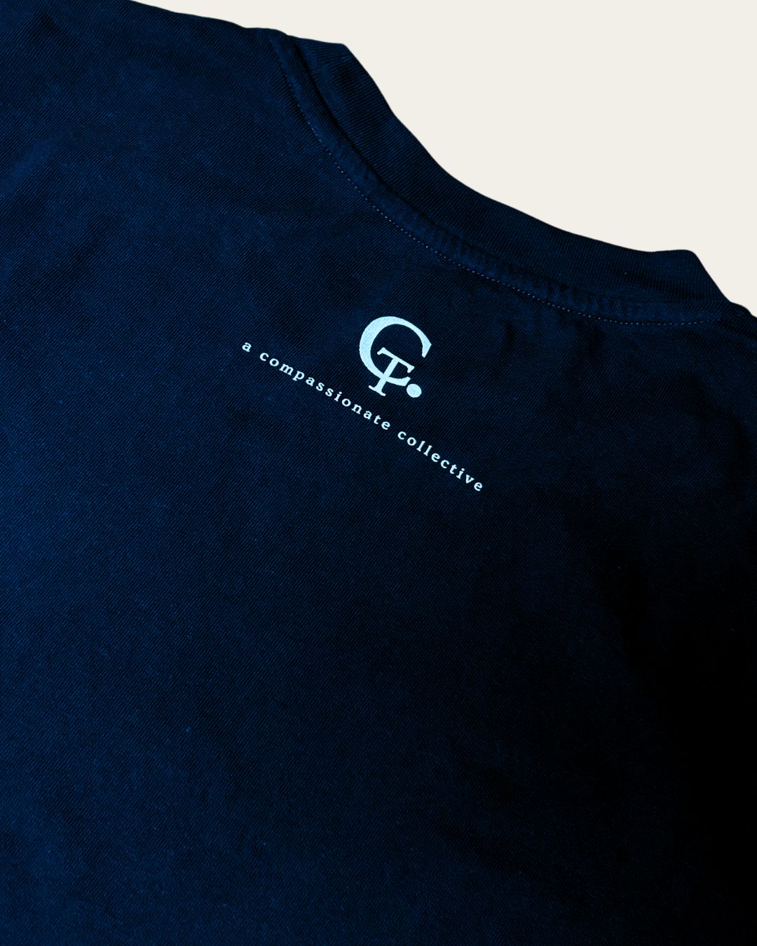 Creating A More Compassionate World T-shirt T-Shirt Compassion Threads Sustainable vegan clothing premium ethical cruelty-free fashion