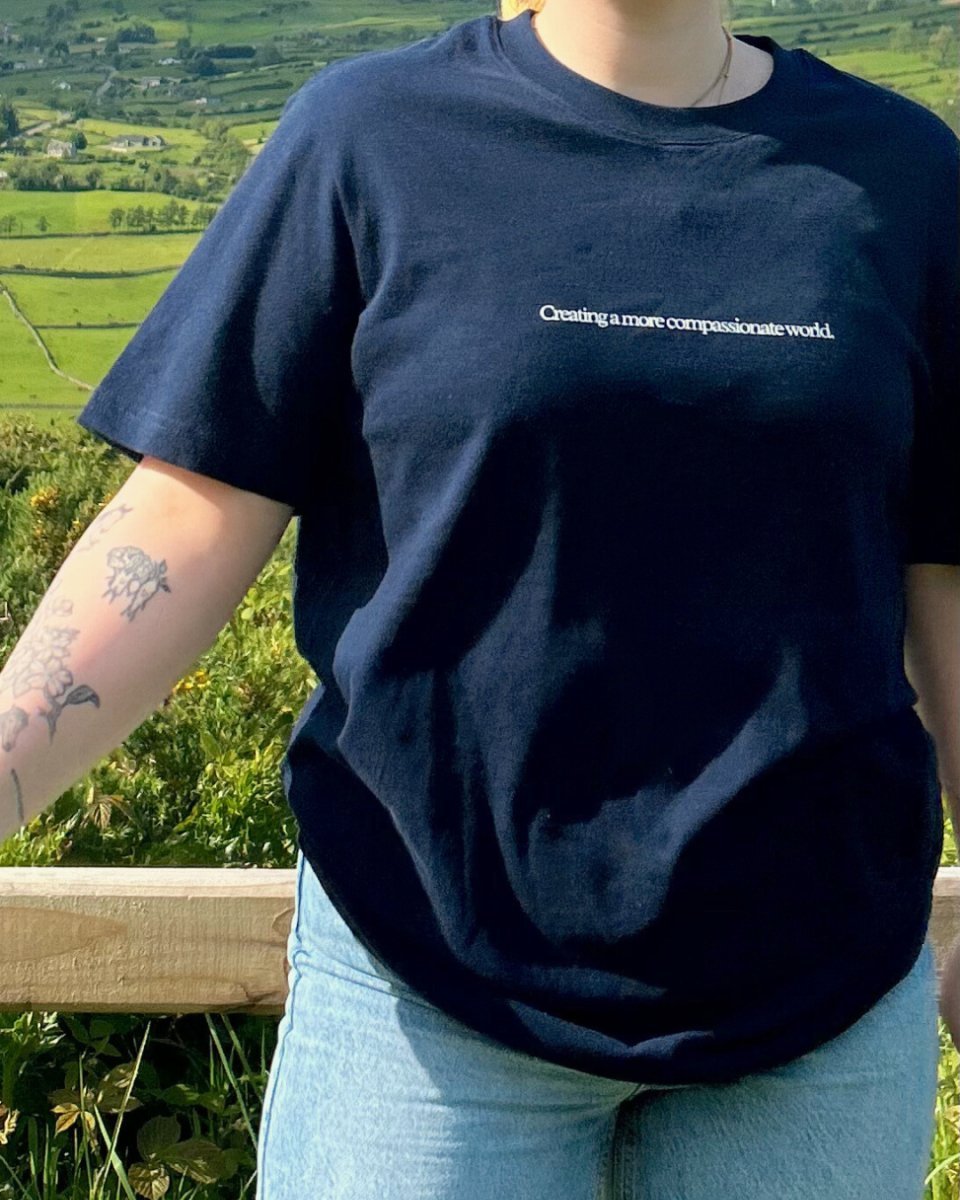 Creating A More Compassionate World T-shirt T-Shirt Compassion Threads Sustainable vegan clothing premium ethical cruelty-free fashion