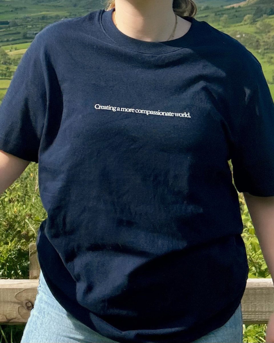 Creating A More Compassionate World T-shirt T-Shirt Compassion Threads Sustainable vegan clothing premium ethical cruelty-free fashion