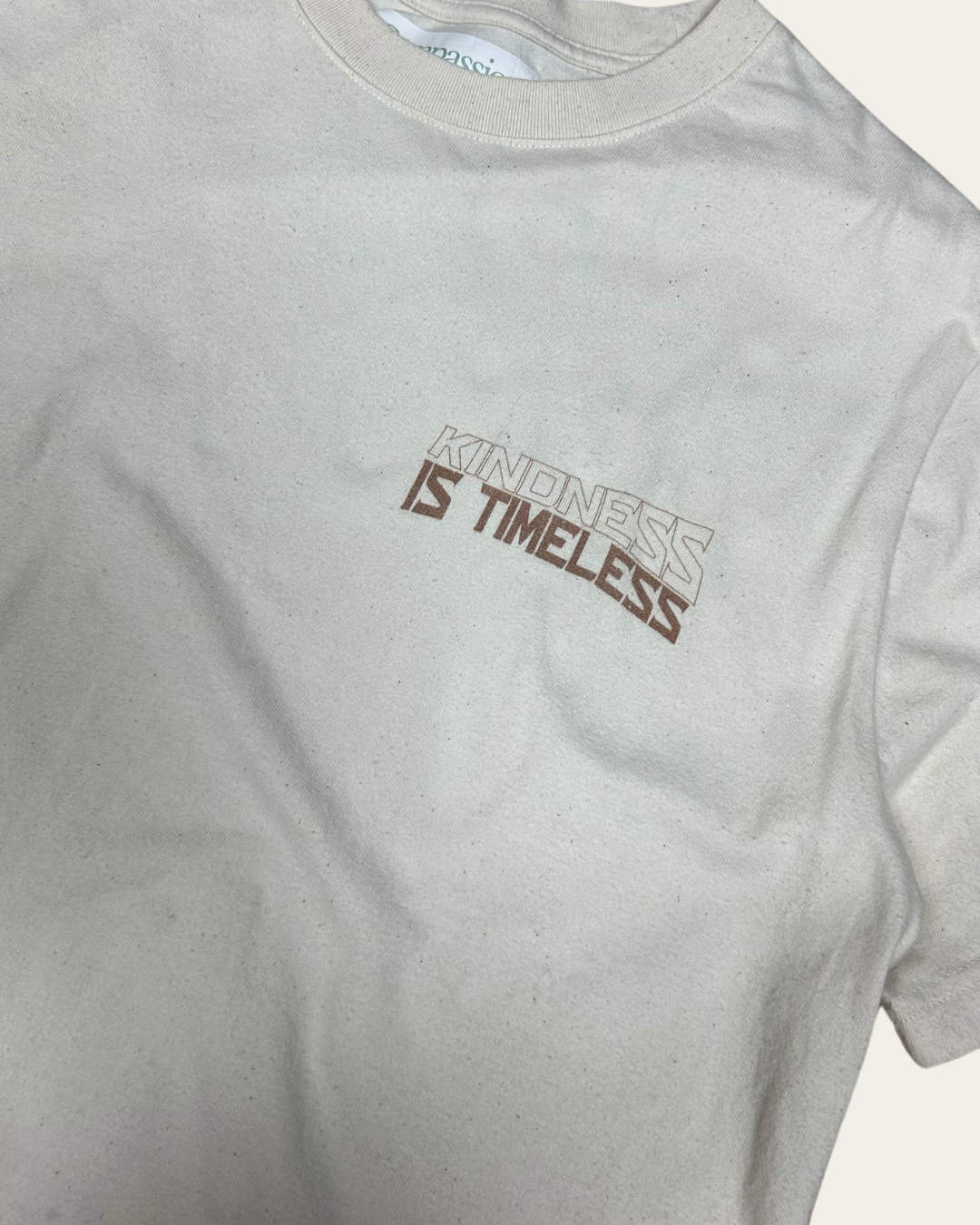 Kindness Is Timeless Graphic Tee Relaxed Fit T-shirt Cream T-Shirt Compassion Threads Sustainable vegan clothing premium ethical cruelty-free fashion