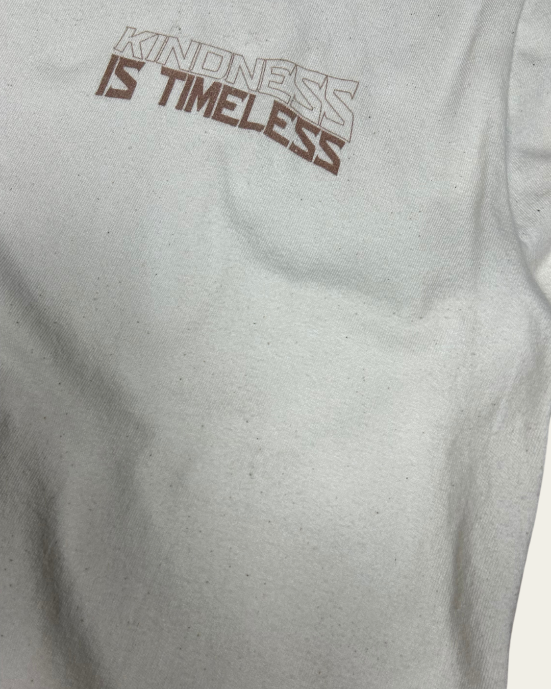 Kindness Is Timeless Graphic Tee Relaxed Fit T-shirt Cream T-Shirt Compassion Threads Sustainable vegan clothing premium ethical cruelty-free fashion