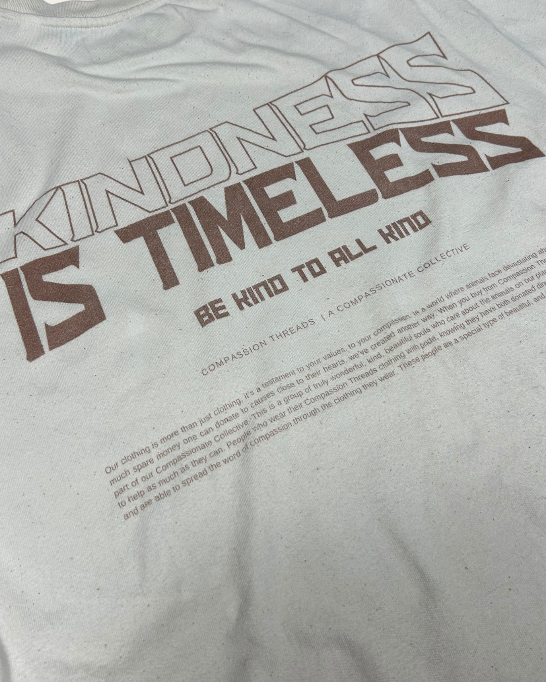 Kindness Is Timeless Graphic Tee Relaxed Fit T-shirt Cream T-Shirt Compassion Threads Sustainable vegan clothing premium ethical cruelty-free fashion