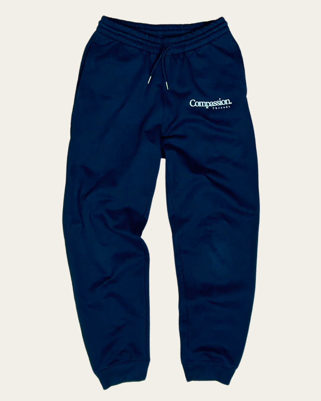 Logo Joggers Navy Blue Jogger Bottoms Compassion Threads Sustainable vegan clothing premium loungewear oversized streetwear ethical fashion